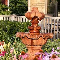 Fountain and flowers in front yard
